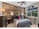 Youthful bedroom with wood-paneled wall and a basketball theme at 3513 Pinetree Rd, Orlando, FL 32804