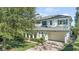 Two-story home with white siding and gray roof at 3513 Pinetree Rd, Orlando, FL 32804