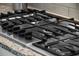 Stainless steel gas cooktop with five burners at 3513 Pinetree Rd, Orlando, FL 32804