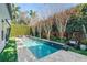 Relaxing pool area with water features and lush landscaping at 3513 Pinetree Rd, Orlando, FL 32804