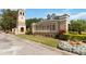 Entrance to the Bella Lago community featuring a clock tower and signage at 3564 Landing Net Dr, Kissimmee, FL 34746