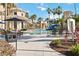 Resort-style pool with lounge chairs and palm trees at 3564 Landing Net Dr, Kissimmee, FL 34746