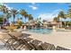 Resort-style pool with fountain and lounge chairs at 3564 Landing Net Dr, Kissimmee, FL 34746