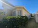 House exterior showcasing landscaping and corner window at 5119 Santa Ana Dr, Orlando, FL 32837