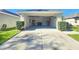 Garage with painted floor and storage shelves at 5119 Santa Ana Dr, Orlando, FL 32837