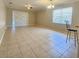 Spacious living room with tile floors and ceiling fan at 5119 Santa Ana Dr, Orlando, FL 32837