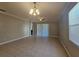 Bright and spacious living room with sliding door at 5119 Santa Ana Dr, Orlando, FL 32837