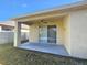 Covered patio with sliding glass doors and a ceiling fan at 5119 Santa Ana Dr, Orlando, FL 32837