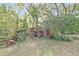 Large backyard with shed and mature trees at 5217 N Apopka Vineland Rd, Orlando, FL 32818