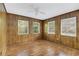 Empty bedroom featuring laminate wood flooring and ceiling fan at 5217 N Apopka Vineland Rd, Orlando, FL 32818