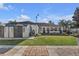 Large backyard, shed, and patio area at 539 Pinehurst Cv, Kissimmee, FL 34758