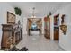 Elegant dining room features a fireplace and built-in curio cabinet at 539 Pinehurst Cv, Kissimmee, FL 34758