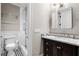 Elegant bathroom featuring marble vanity and a shower with glass enclosure at 567 Osceola Ave, Winter Park, FL 32789