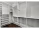 Large walk-in closet with ample shelving and hanging space at 567 Osceola Ave, Winter Park, FL 32789