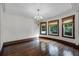 Elegant dining room featuring hardwood floors, crown molding, and a chandelier at 567 Osceola Ave, Winter Park, FL 32789