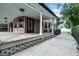 Inviting front porch with large columns and walkway at 567 Osceola Ave, Winter Park, FL 32789