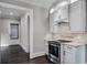 Modern kitchen with white cabinets and stainless steel appliances at 567 Osceola Ave, Winter Park, FL 32789