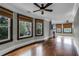 Spacious living room with hardwood floors, fireplace and bay windows at 567 Osceola Ave, Winter Park, FL 32789