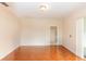 Bright bedroom with wood-look tile flooring at 587 Bluff Pass Dr, Eustis, FL 32726