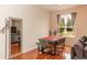 Dining area with a modern table and chairs, and ample natural light at 587 Bluff Pass Dr, Eustis, FL 32726