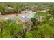 Aerial view of new construction in a neighborhood surrounded by lush green trees at 6579 Sw 132Nd St, Ocala, FL 34473