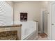 Bathroom with soaking tub and walk in shower at 7927 Oakstone Ct, Orlando, FL 32822