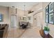 Bright dining room with a round table and chairs near the kitchen at 7927 Oakstone Ct, Orlando, FL 32822