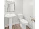 Clean and updated half bathroom with pedestal sink at 8133 Citrus Chase Dr, Orlando, FL 32836