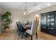 Dining room with oval table, six chairs, and china cabinet at 856 La Gran Via Lane, Apopka, FL 32703