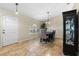 Dining area features a table for six and built-in hutch at 856 La Gran Via Lane, Apopka, FL 32703