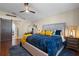 Main bedroom with king-size bed and stylish decor at 856 La Gran Via Lane, Apopka, FL 32703