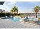 Relaxing pool and spa with water features and lounge chairs at 10631 Royal Cypress Way, Orlando, FL 32836