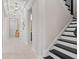 Modern staircase with black and white design at 10631 Royal Cypress Way, Orlando, FL 32836