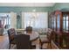 Elegant dining room featuring a chandelier and hardwood floors at 1325 Paperwoods Dr, St Cloud, FL 34772