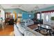 Bright dining room with a chandelier and wooden furniture at 1325 Paperwoods Dr, St Cloud, FL 34772