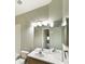 Bathroom featuring a double mirror, vanity, and neutral walls at 13536 Turtle Marsh Loop # 538, Orlando, FL 32837