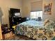 Cozy bedroom with a double bed and ample closet space at 13536 Turtle Marsh Loop # 538, Orlando, FL 32837