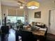 Bright dining area with a marble top table and seating for four at 13536 Turtle Marsh Loop # 538, Orlando, FL 32837