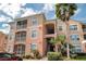 Two-story condo building with inviting entryway and landscaping at 13536 Turtle Marsh Loop # 538, Orlando, FL 32837