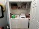 Small laundry room with washer and dryer at 13536 Turtle Marsh Loop # 538, Orlando, FL 32837