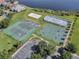 Aerial view showing tennis courts, basketball court, and a skating rink at 14742 Masthead Landing Cir, Winter Garden, FL 34787