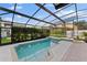 Refreshing pool with screened enclosure and ample patio space at 14742 Masthead Landing Cir, Winter Garden, FL 34787