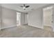 Large bedroom with ceiling fan and walk-in closet at 1479 Brookdale Ct, Oviedo, FL 32765