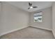 Bright bedroom with carpeted floor and ceiling fan at 1479 Brookdale Ct, Oviedo, FL 32765