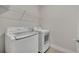 Laundry room with washer, dryer, and shelving at 1479 Brookdale Ct, Oviedo, FL 32765