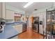 Bright kitchen with stainless steel appliances and ample counter space at 1613 Oriole Ave, Orlando, FL 32803