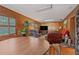 Relaxing living room featuring hardwood floors and comfortable seating at 1613 Oriole Ave, Orlando, FL 32803