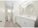 Bathroom with double vanity and shower at 16247 Lake Johns Cir, Winter Garden, FL 34787