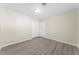 Bedroom with double door closet and wood-look floors at 16247 Lake Johns Cir, Winter Garden, FL 34787