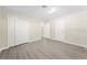 Bright bedroom with double door closet and wood floors at 16247 Lake Johns Cir, Winter Garden, FL 34787